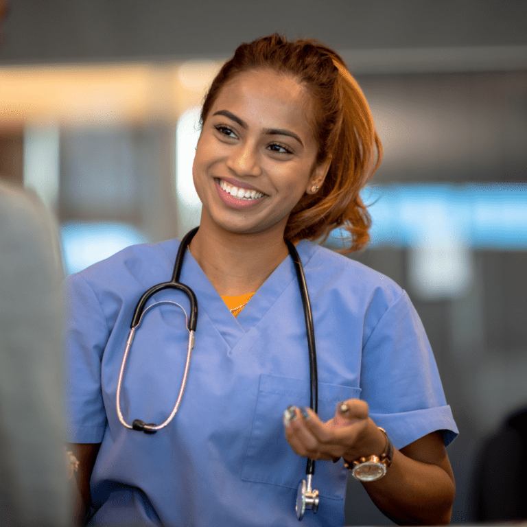 Smiling nurse wearing a stethoscope